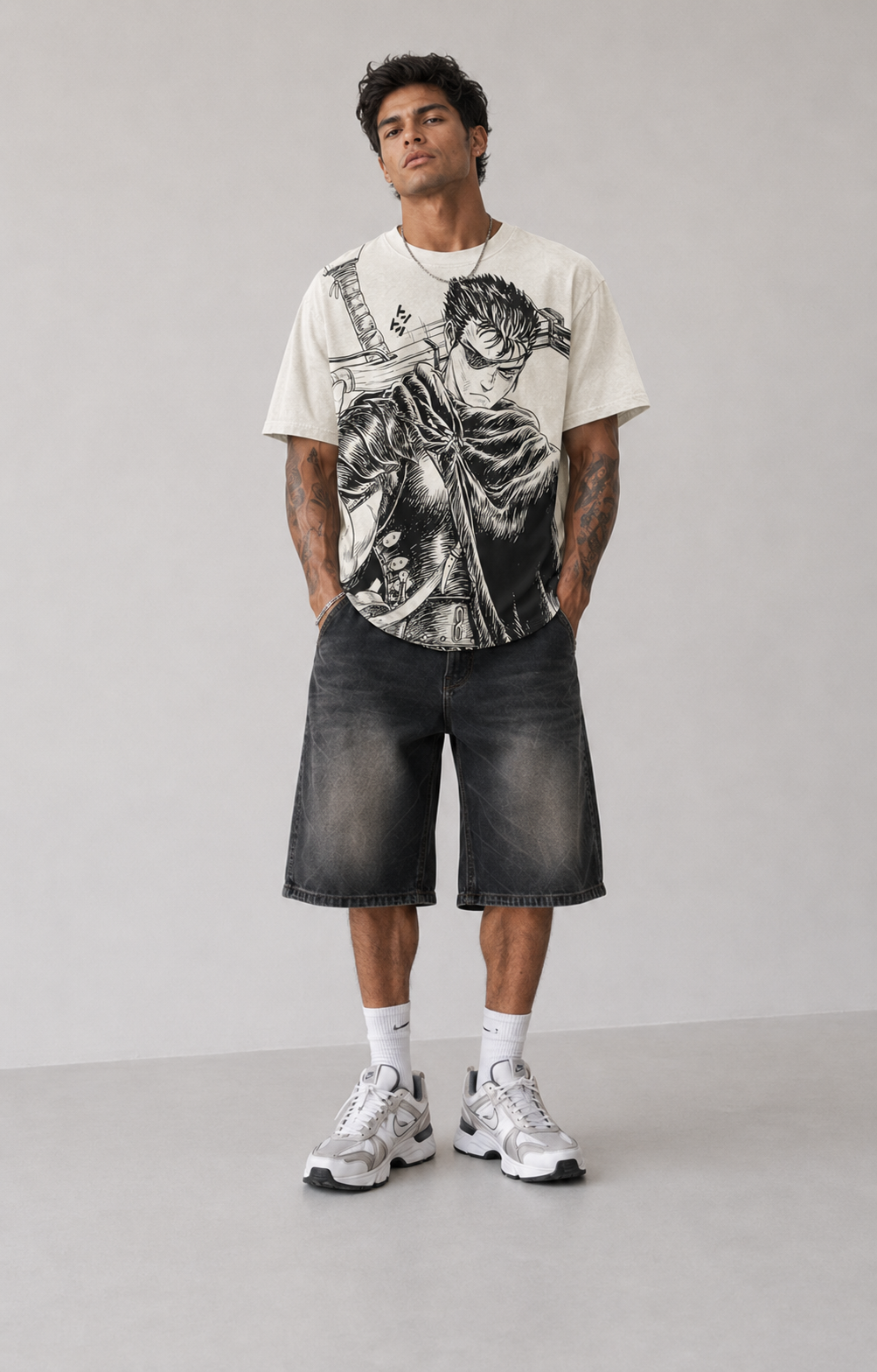 Model wearing Berserk Guts Black Swordsman Oversized T-Shirt, styled view 2