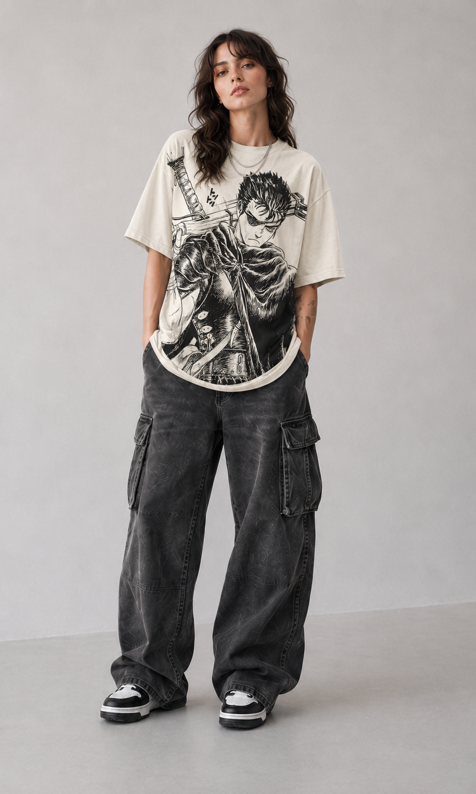 Model wearing Berserk Guts Black Swordsman Oversized T-Shirt, styled view 3