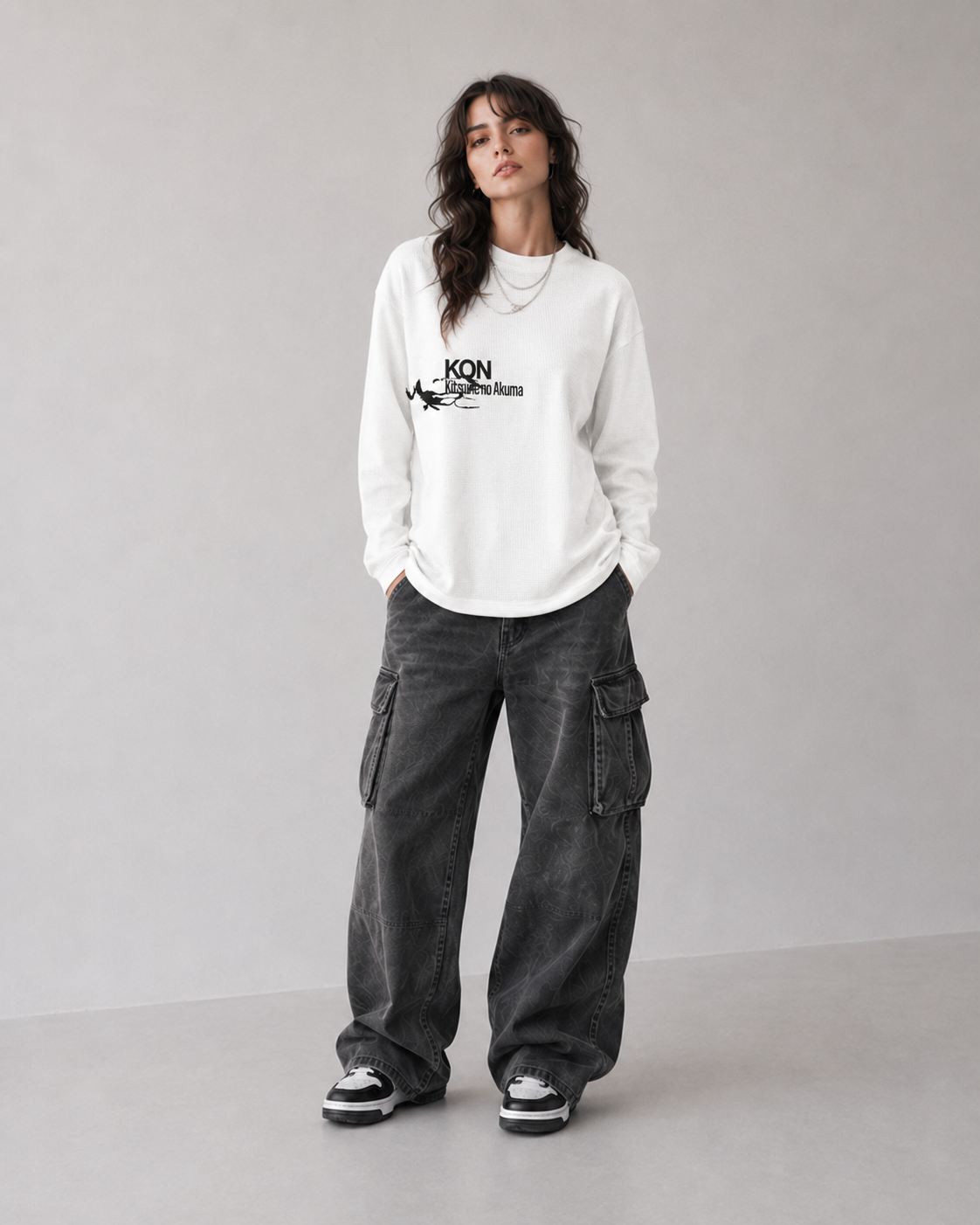 Model wearing Berserk Hand & Eclipse Eye Long Sleeve Shirt, styled view 3