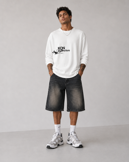 Model wearing Berserk Hand & Eclipse Eye Long Sleeve Shirt, styled view 6