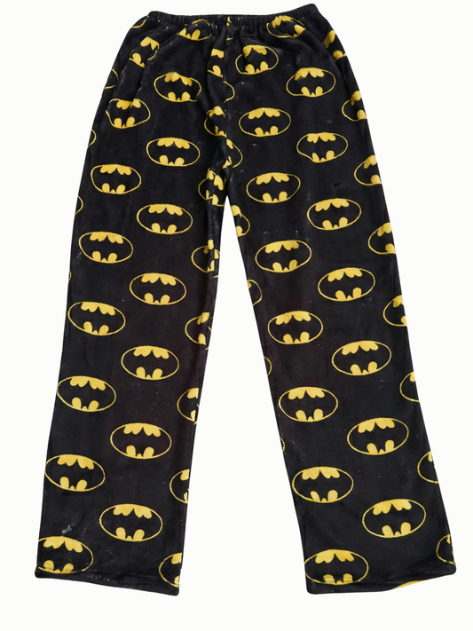 Black pajama pants with yellow Batman logos on a white background