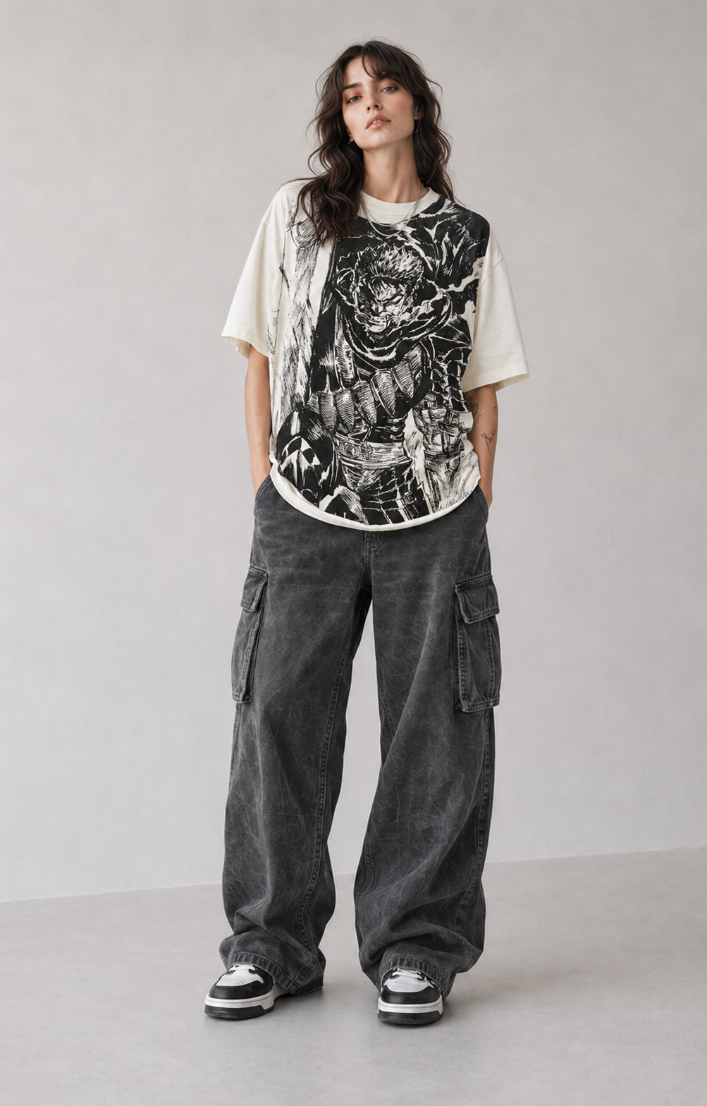 Female model wearing Berserk Guts Berserker Armor oversized T-shirt