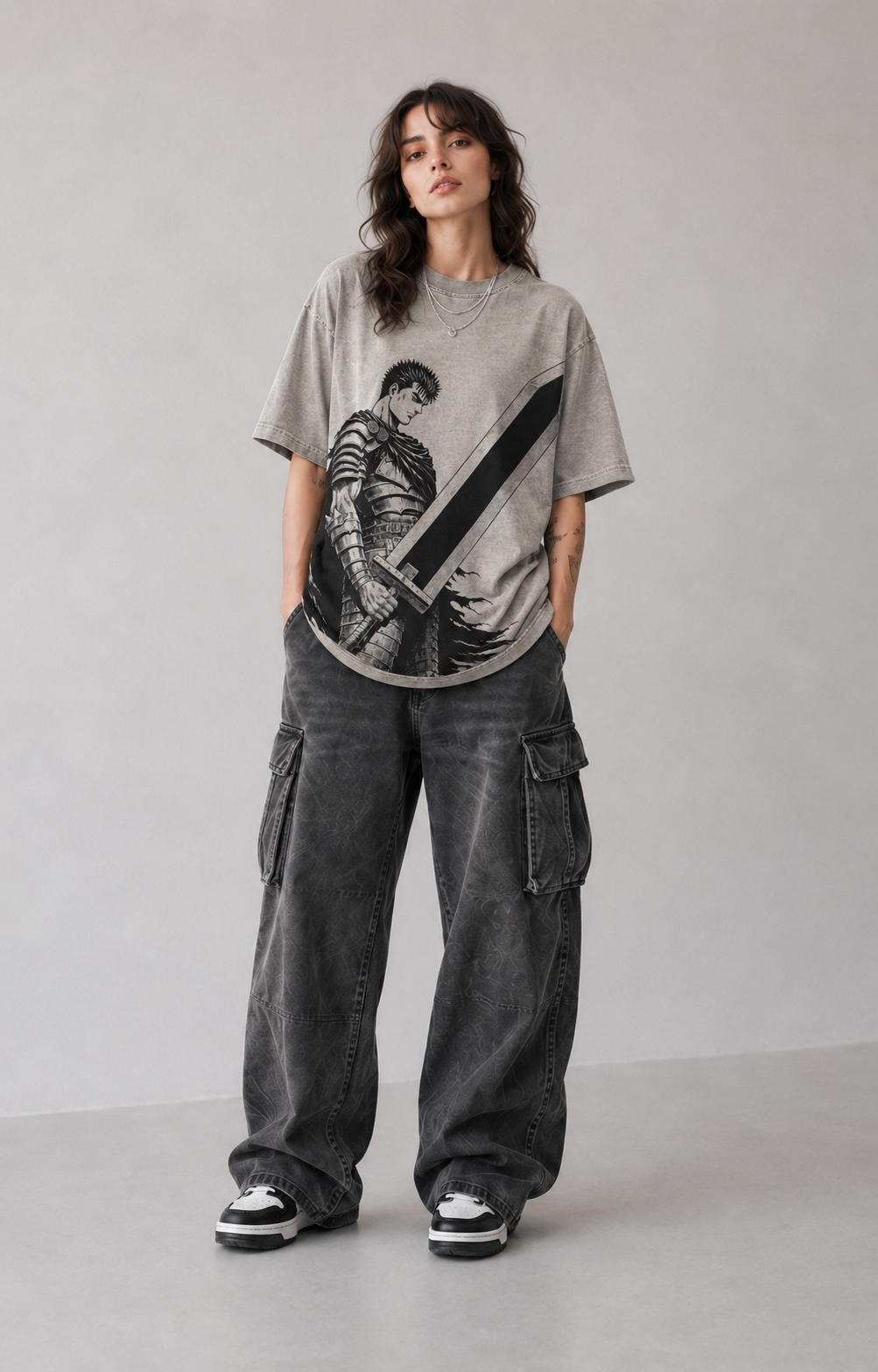 Female model wearing Berserk Guts Dragonslayer Sword Oversized T-Shirt
