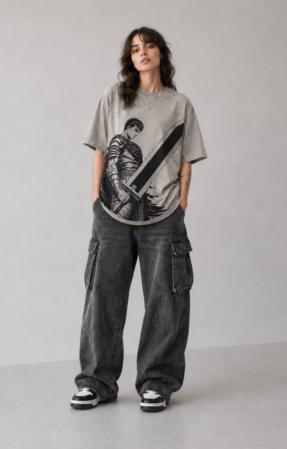 Female model wearing Berserk Guts Dragonslayer Sword Oversized T-Shirt