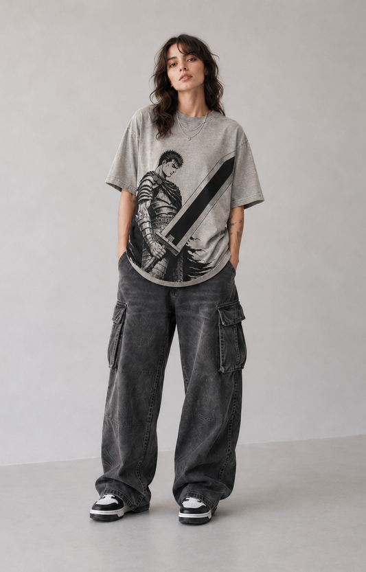 Female model wearing Berserk Guts Dragonslayer Sword Oversized T-Shirt