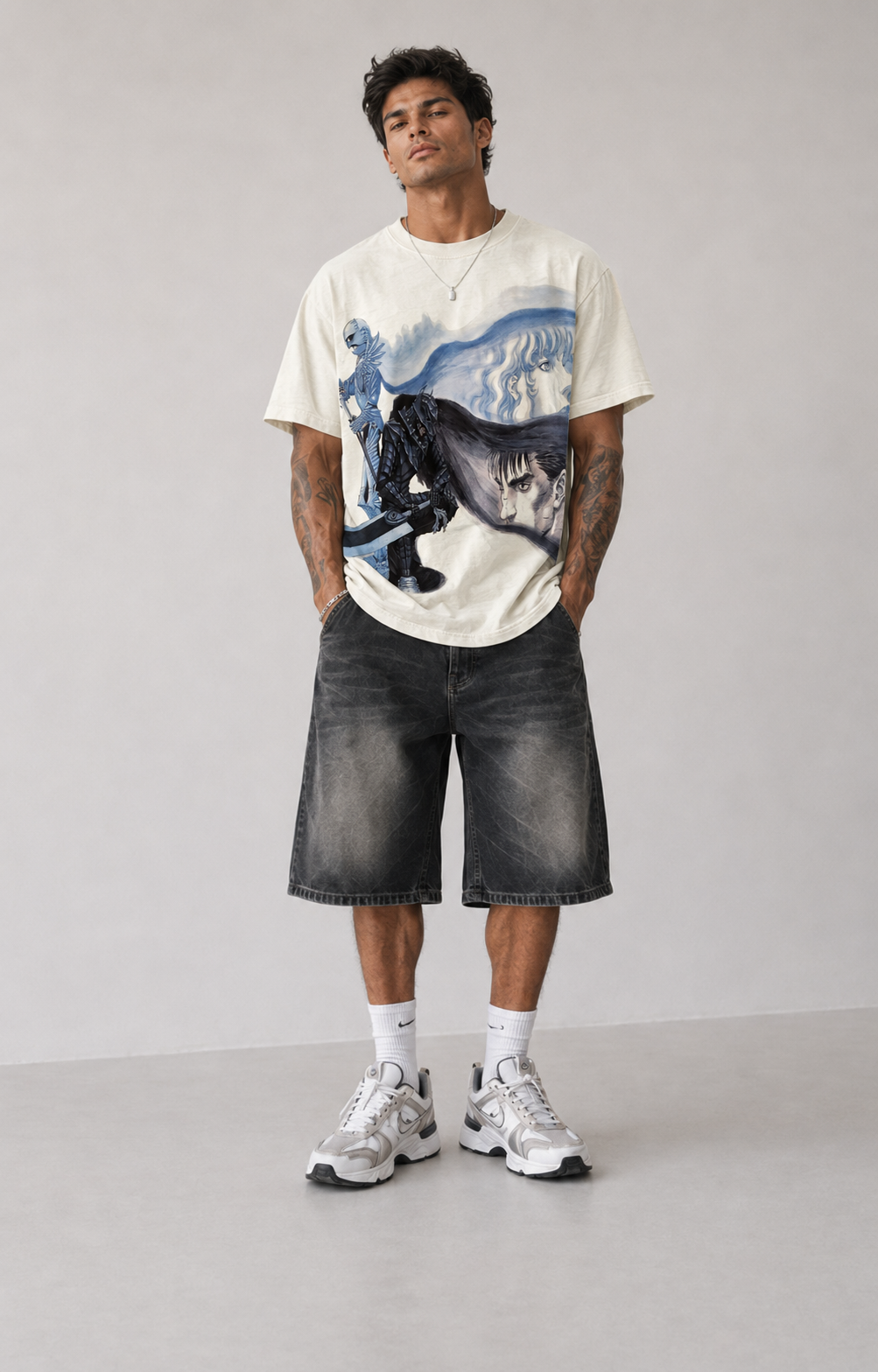 Male model wearing Berserk Guts Blue Swordsman Oversized T-Shirt