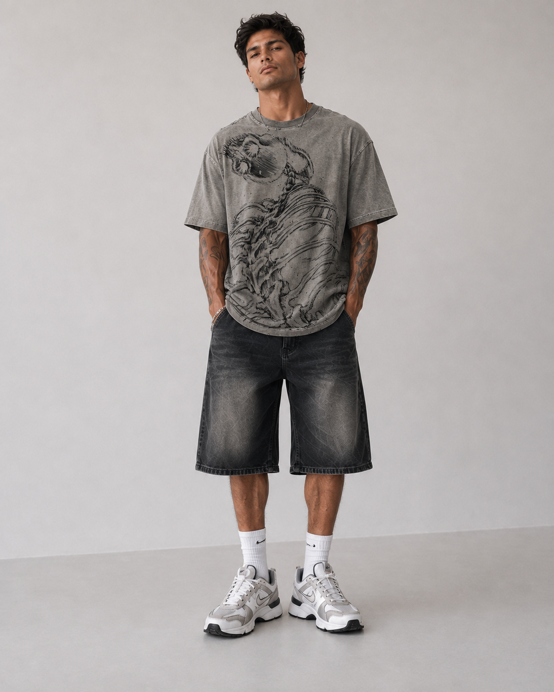 Male model wearing Attack on Titan Eren and Colossal Titan Oversized T-Shirt