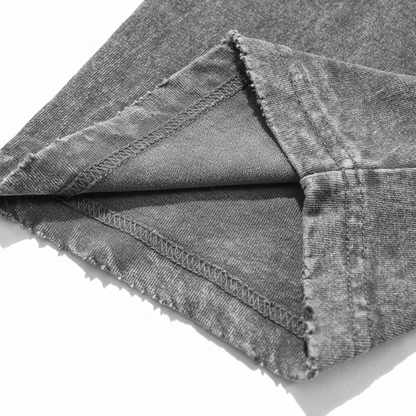 Close up of distressed bottom hem and double needle stitching on 240 GSM acid wash cotton.