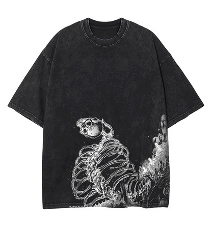 Front view of oversized 240 GSM vintage black acid wash t-shirt featuring the lower torso wrap-around graphic of the Attack on Titan Founding Titan skeleton and steam