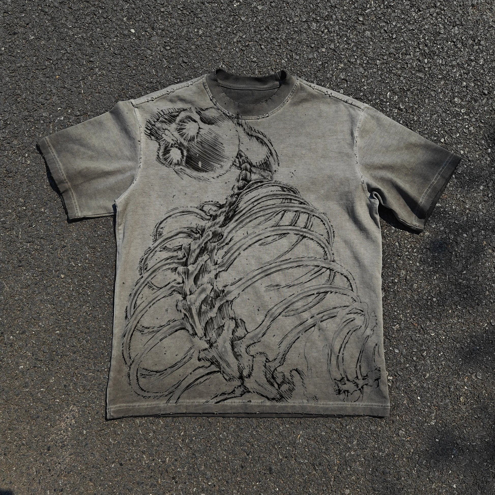 Eren Attack Titan and Colossal Titan manga graphic on grey oversized T-shirt