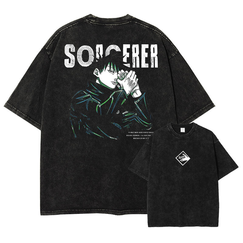 Front and back view of oversized 240 GSM vintage black acid wash tee. Front features minimalist white Divine Dog hand sign logo. Back features Megumi Fushiguro forming a hand sign with distressed Sorcerer typography and green highlights