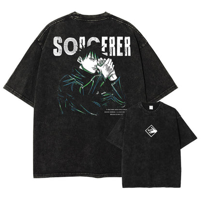 Front and back view of oversized 240 GSM vintage black acid wash tee. Front features minimalist white Divine Dog hand sign logo. Back features Megumi Fushiguro forming a hand sign with distressed Sorcerer typography and green highlights