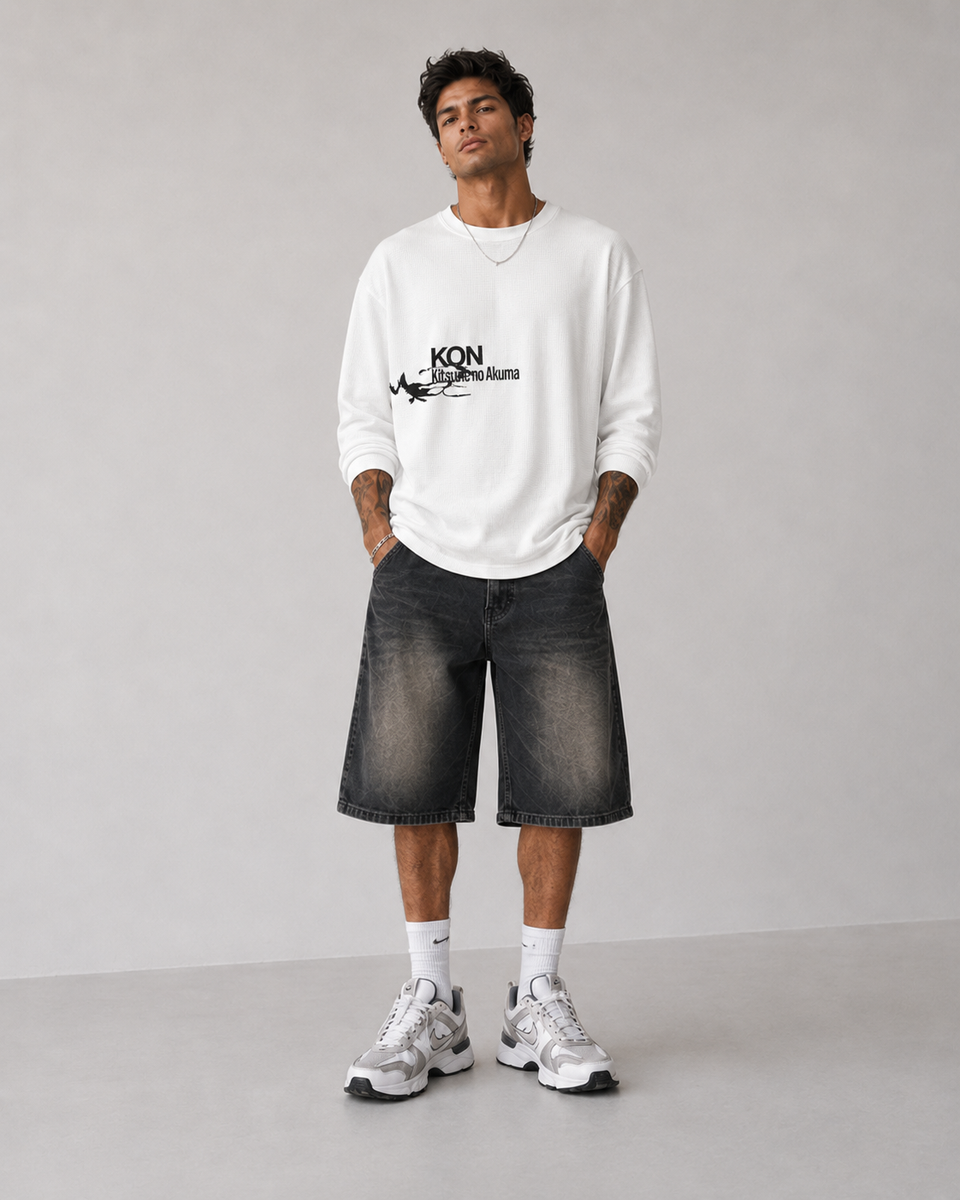 Model wearing Berserk Hand & Eclipse Eye Long Sleeve Shirt, styled view 6