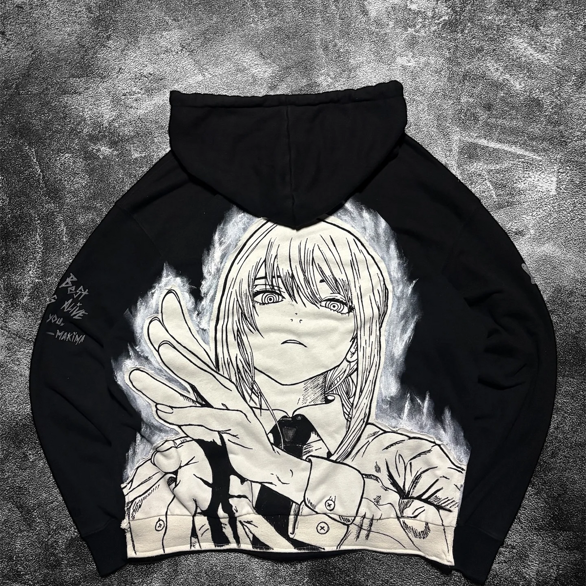 Back view of the SkaiiyPrints heavyweight zip-up hoodie featuring a large Makima manga panel graphic.