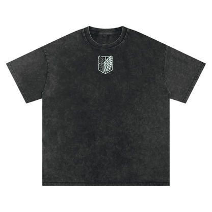 Front view of oversized 240 GSM vintage black acid wash t-shirt featuring glowing minimalist Attack on Titan Survey Corps chest logo.